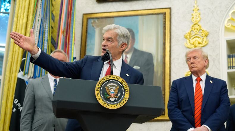 President Donald Trump listens as Centers for Medicare & Medicaid Services administrator Dr. Mehmet Oz speaks in the Oval Office of the White House, Friday, Oct. 10, 2025, in Washington. (AP Photo/Alex Brandon)