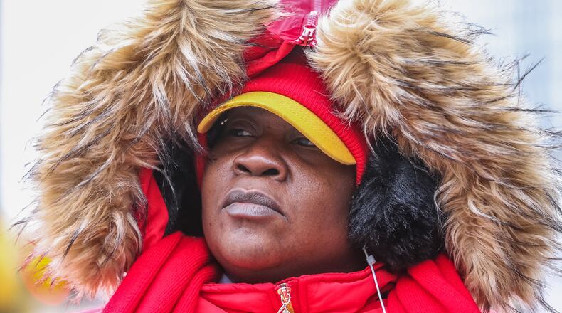 Carolyn Williams is bundled up Thursday in Five Points. JOHN SPINK / JSPINK@AJC.COM