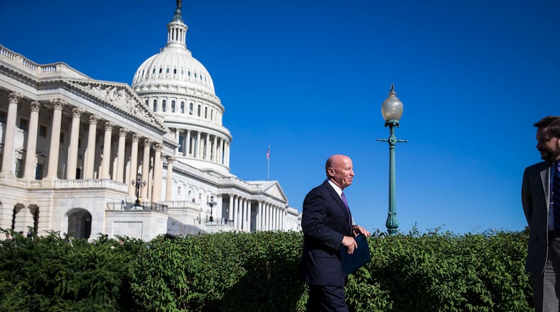 Rep. Kevin Brady (R-Texas), chairman of the House Ways and Means committee, walks outside the U.S. Capitol, Sept. 28. (Al Drago / The New York Times)