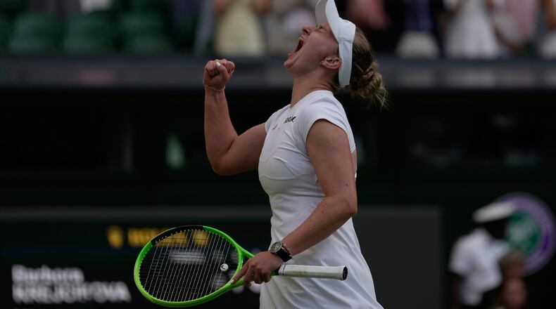Barbora Krejcikova of Czech Republic celebrates her victory against Mirra Andreeva of Russia in their second round women's singles match at the Wimbledon Tennis Championships in London, Wednesday, July 1, 2026. (AP Photo/Brian Inganga)