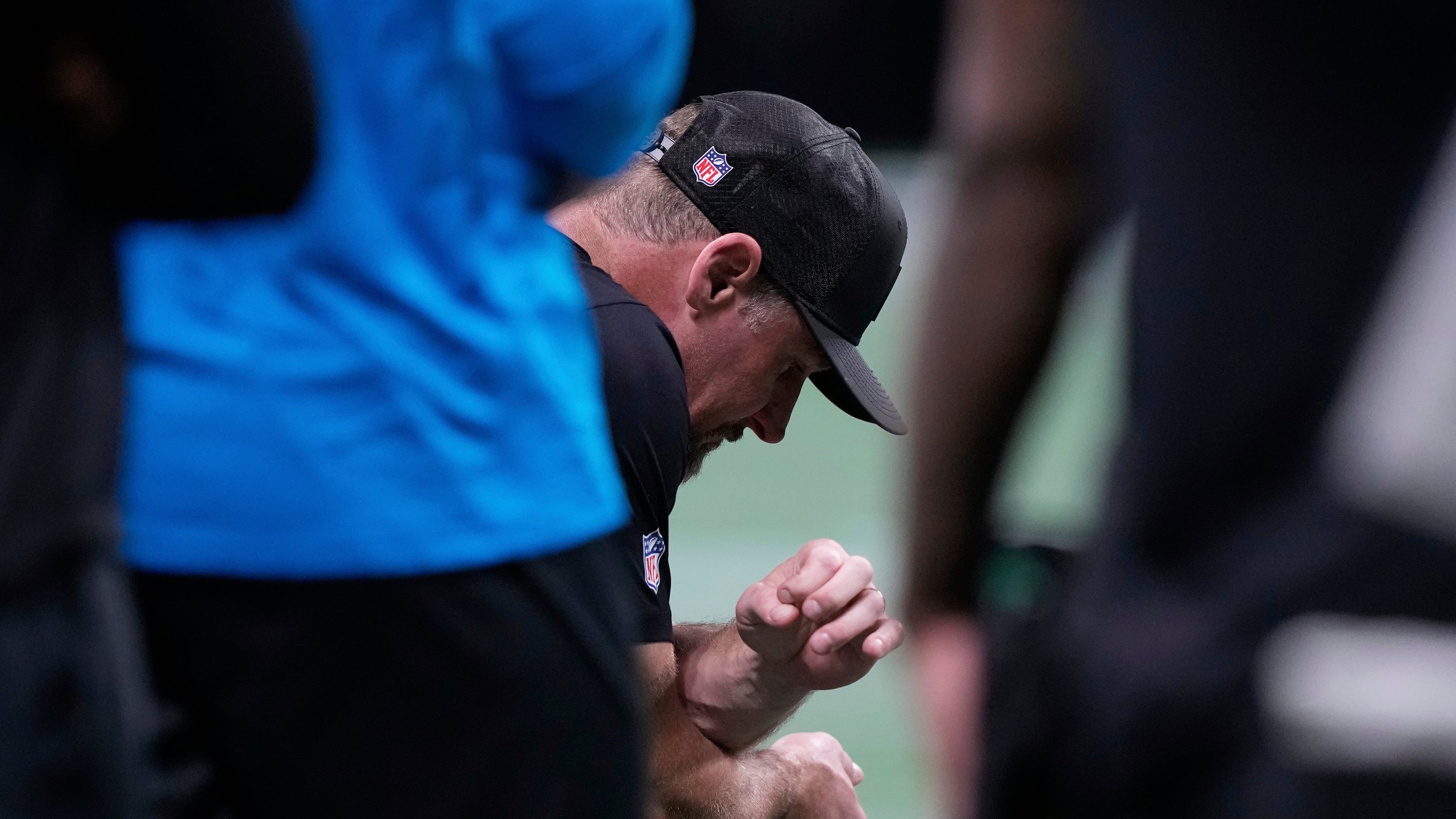Detroit Lions head coach Dan Campbell kneels after safety Morice Norris was injured during the second half of an NFL preseason football game on Friday, Aug. 8, 2025, in Atlanta. (Brynn Anderson/AP)