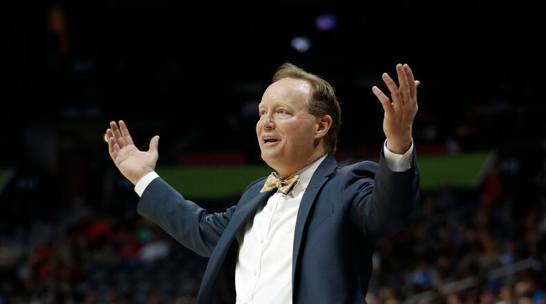 Atlanta Hawks coach Mike Budenholzer reacts after his team was charged with a foul during the second half of an NBA basketball game against the Washington Wizards on Friday, Jan. 27, 2017, in Atlanta. Washington won 112-86. (AP Photo/John Bazemore)