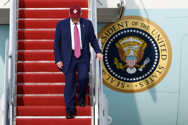 President Donald Trump walks down the stairs of Air Force One upon his arrival at Joint Base Andrews, Md., Tuesday, June 10, 2025. (AP Photo/Luis M. Alvarez)