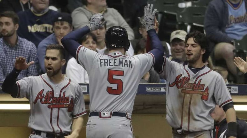 Freddie Freeman has had plenty of recent success hitting at Miller Park, including a game-winning homer in the ninth inning Friday. But the Braves slugger said he still hates hitting at the domed stadium. (AP photo)