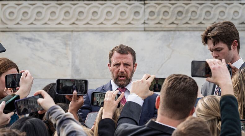 Sen. Markwayne Mullin, R-Okla., speaks with reporters on the steps at the Capitol in Washington, Thursday, March 5, 2026. (AP Photo/J. Scott Applewhite)