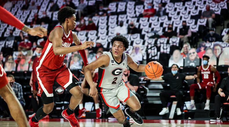 Georgia guard Sahvir Wheeler (2) dribbles against Alabama at Stegeman Coliseum in Athens on Saturday, March 6, 2021. (Photo by Tony Walsh/UGA Athletics)