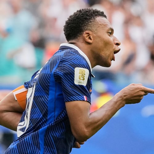 France's Kylian Mbappe (10) celebrates scoring his side's third goal during the World Cup third-place playoff soccer match between France and England in Miami Gardens, Fla., Saturday, July 18, 2026. (AP Photo/Rebecca Blackwell)