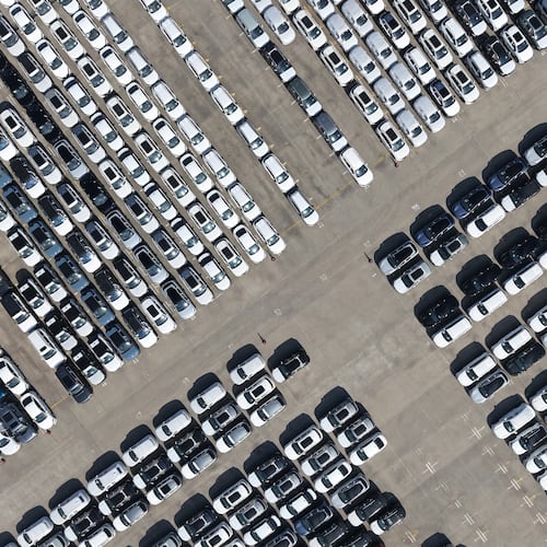 FILE -An aerial view of new cars awaiting export to oversea markets is seen at a port in Shanghai, March 10, 2026. (Chinatopix via AP, File)