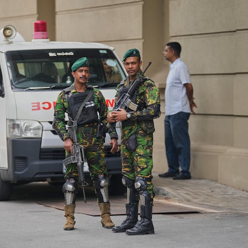 Police commandos stand guard at the High Court complex ahead of a verdict related to the 2019 Easter bombings in Colombo, Sri Lanka, Tuesday, Sept. 22, 2026.(Eranga Jayawardane)
