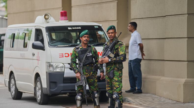 Police commandos stand guard at the High Court complex ahead of a verdict related to the 2019 Easter bombings in Colombo, Sri Lanka, Tuesday, Sept. 22, 2026.(Eranga Jayawardane)