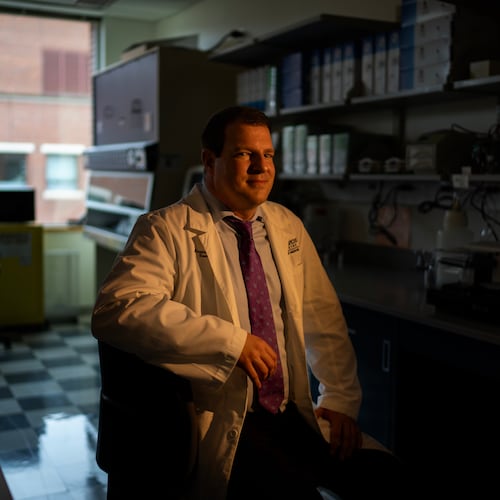 Dr. Maximilian Konig, a rheumatologist at Johns Hopkins University, sits for a portrait in the lab where he's studying some possible new treatments for autoimmune diseases, Tuesday, May 13, 2025, in Baltimore, Md. (AP Photo/David Goldman)
