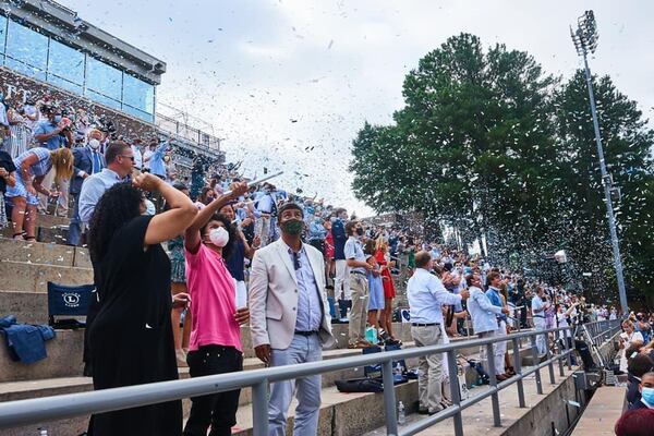 Photos posted on the Lovett School's Facebook page show graduates and most attendees wearing masks, with wide spaces between student seating and space between groups sitting in the bleachers. (Photo courtesy of Lovett School)