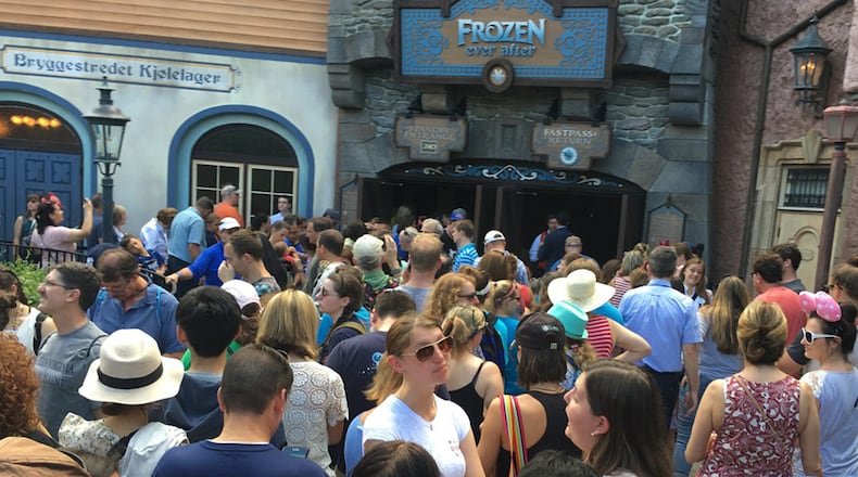 Epcot visitors gather near the entrance of Frozen Ever After, which opened to the public on June 21, 2016. The water boat ride has generated more calls for evacuations to Disney's fire department than any other attraction over the past two years.  (Dewayne Bevil/Orlando Sentinel/TNS)