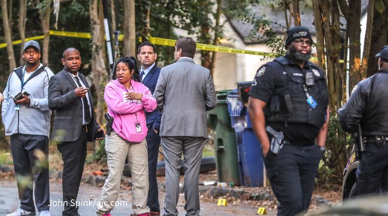 Atlanta police are investigating after shots were fired into a southwest Atlanta home, killing a 57-year-old woman.