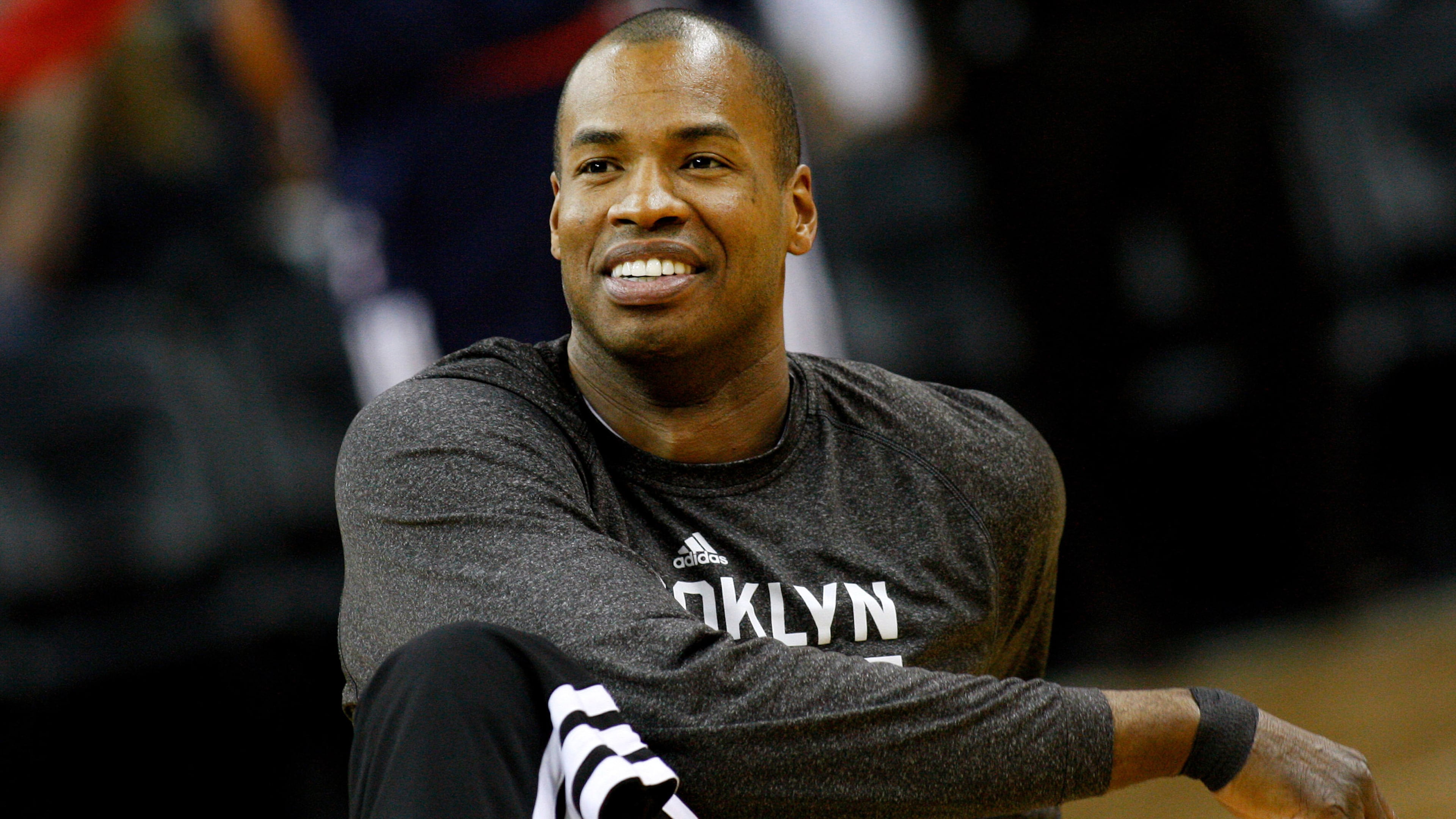 FILE - Brooklyn Nets center Jason Collins (98) warms up before an NBA basketball game in New Orleans, Monday, March 24, 2014. (AP Photo/Jonathan Bachman, File)
