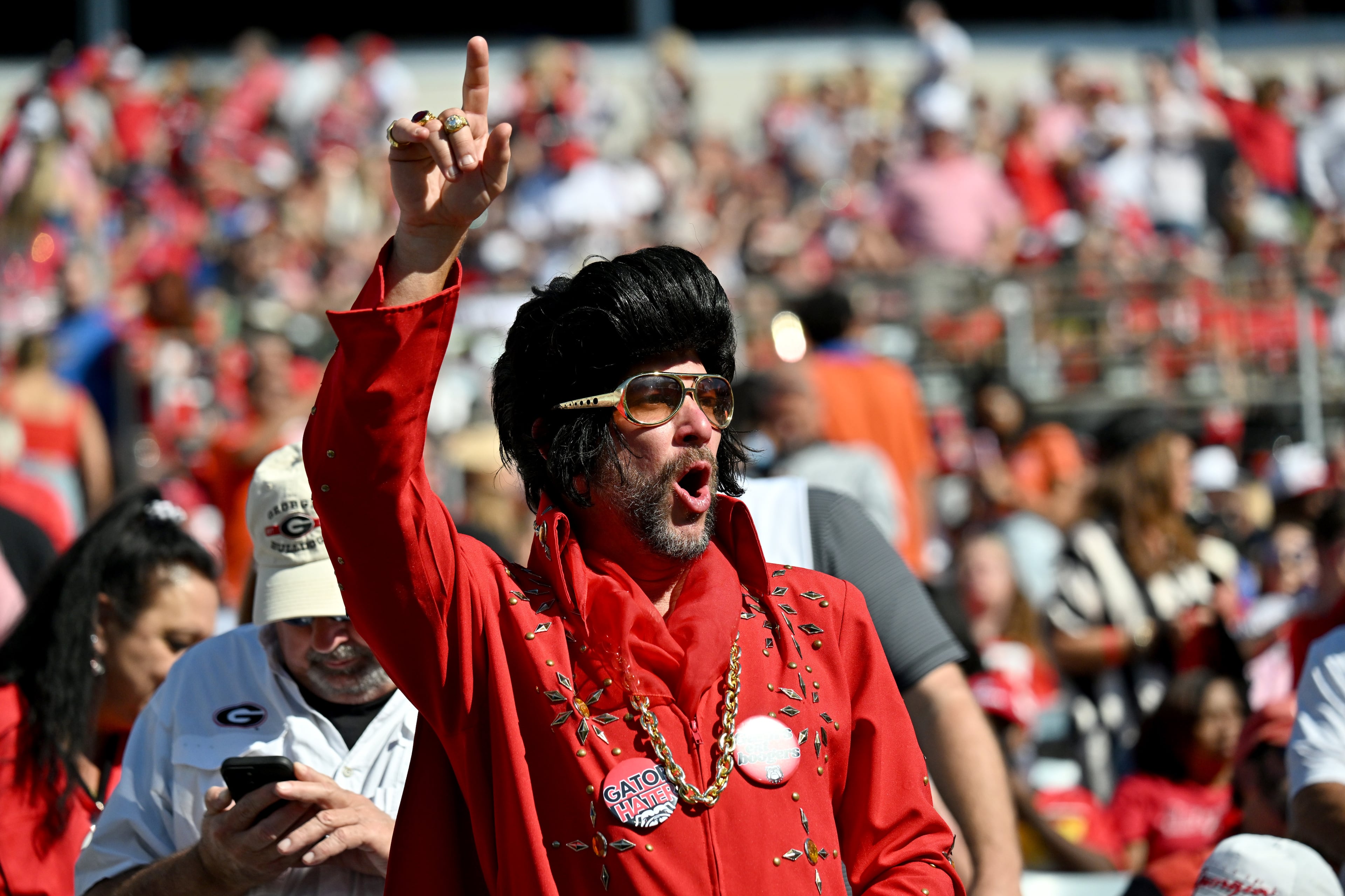 Georgia fan cheer before an NCAA football game between Georgia and Florida at EverBank Stadium, Saturday, November 1, 2025, Jacksonville, Fla. (Hyosub Shin / AJC)
