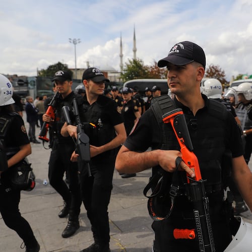Turkish police stand guard outside a courthouse after preventing LGBTQ+ rights supporters from holding a news conference in Istanbul, Turkey, Tuesday, Sept. 15, 2026. (AP Photo/Dilara Acikgoz)
