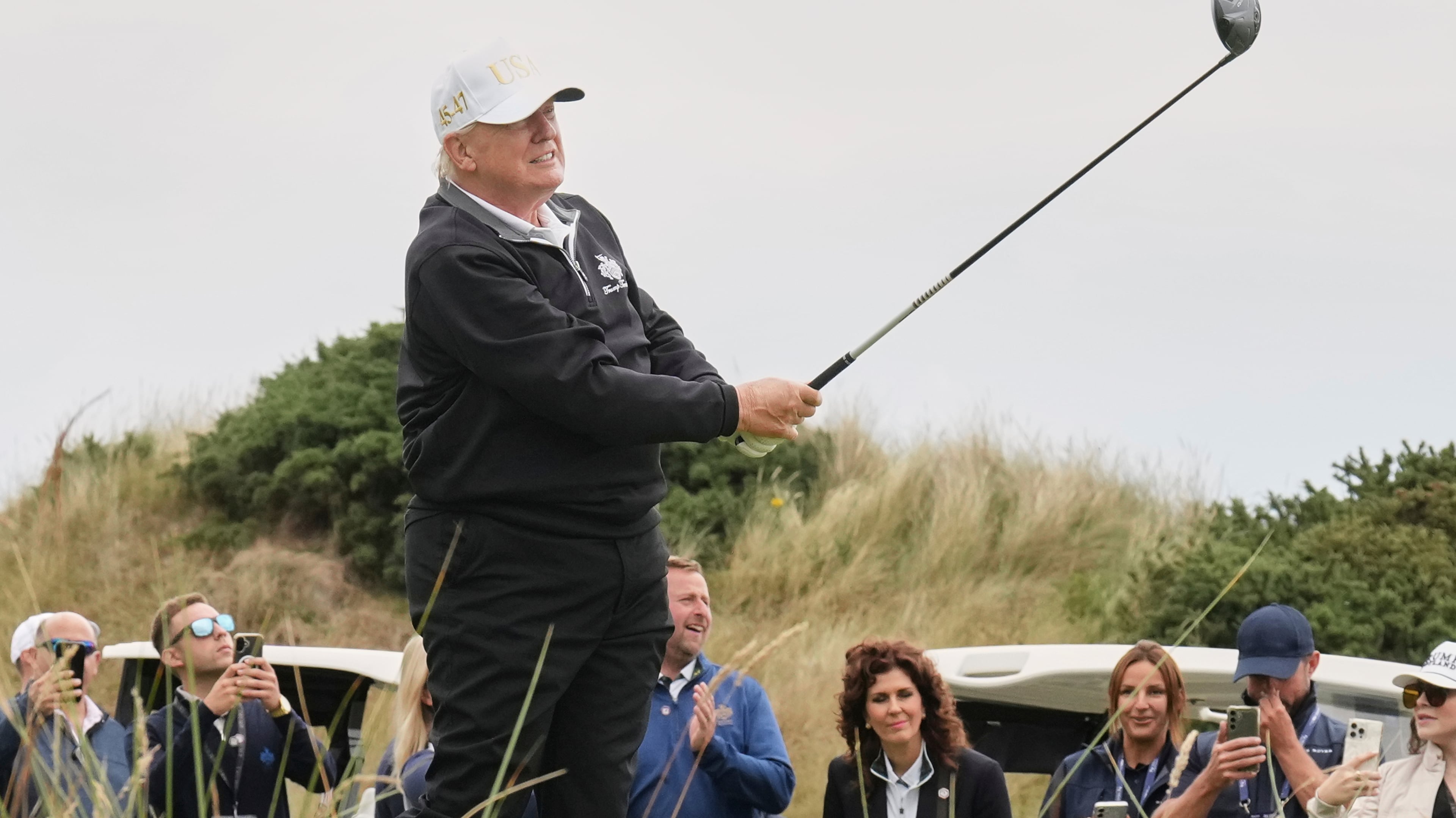 FILE - President Donald Trump tees off during the opening ceremony for the Trump International Golf Links golf course, near Aberdeen, Scotland, July 29, 2025. (AP Photo/Jacquelyn Martin, File)