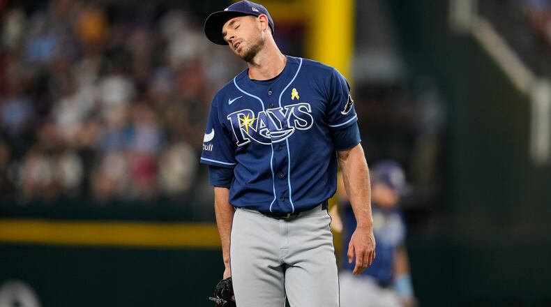 Tampa Bay Rays pitcher Steven Matz turns around on the mound after throwing a pitch to the Texas Rangers during the fifth inning of a baseball game Sunday, Sept. 6, 2026, in Arlington, Texas. (AP Photo/Tony Gutierrez)