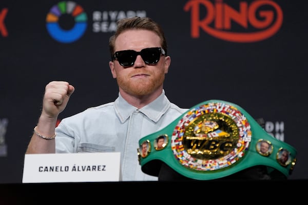 Canelo Alvarez motions during a news conference Friday, June 27, 2025, in Las Vegas. (AP Photo/John Locher)