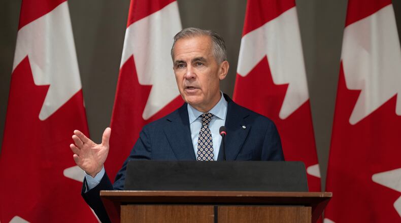 Prime Minister Mark Carney addresses caucus in Ottawa, Friday, Sept. 18, 2026. (Adrian Wyld/The Canadian Press via AP)