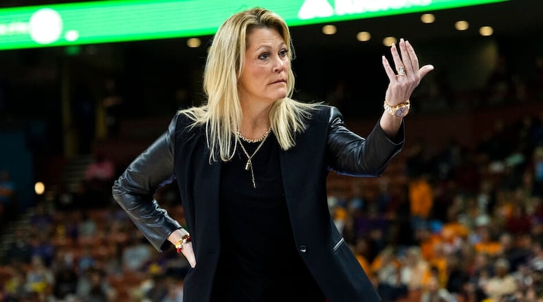 Georgia head coach Katie Abrahamson-Henderson looks to her bench in the first half of an NCAA college basketball game against LSU during the Southeastern Conference women's tournament in Greenville, S.C., Friday, March 3, 2023. (AP Photo/Mic Smith)