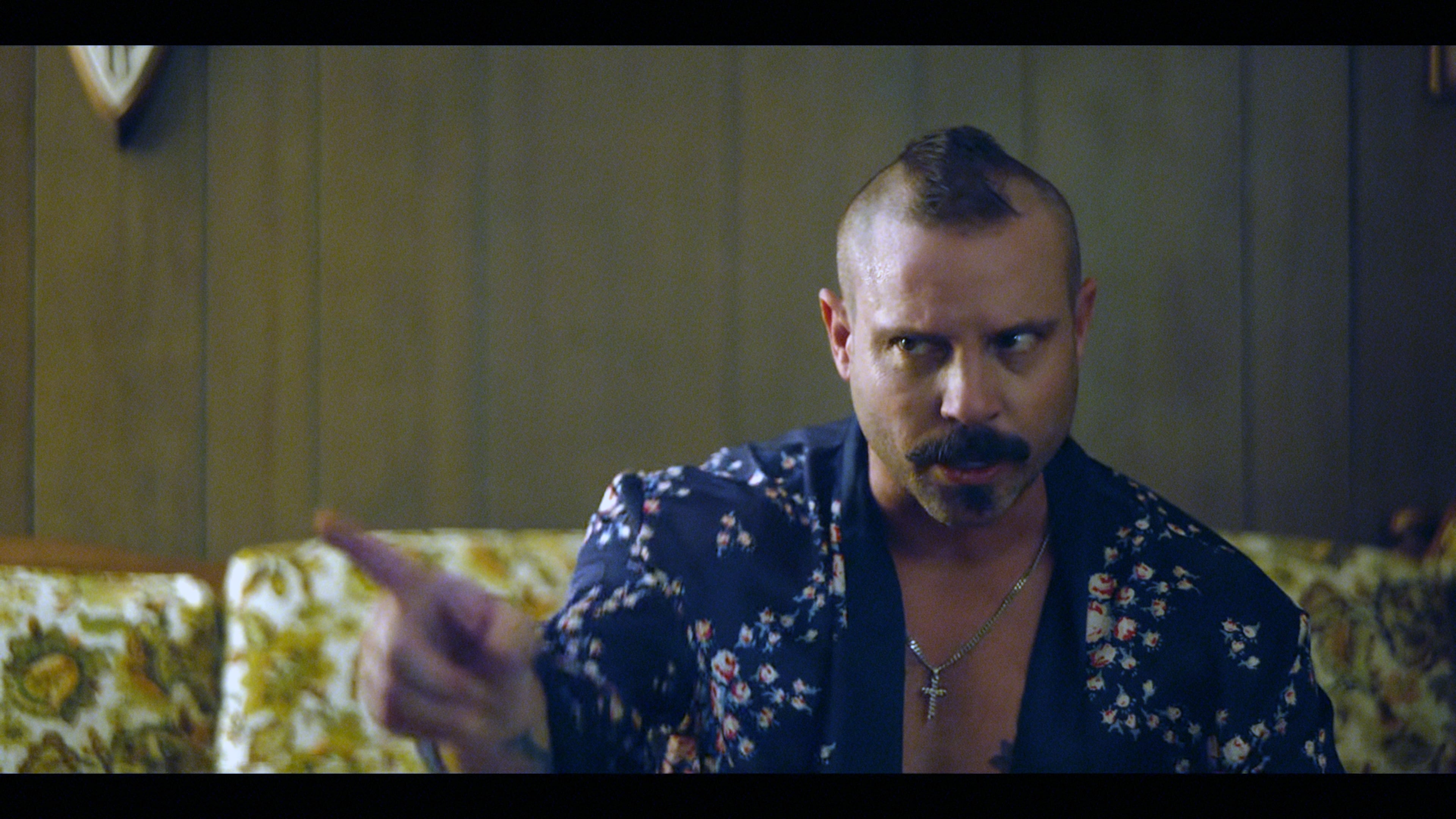 Michael Aaron Milligan, Atlanta actor and Woodstock High School graduate, plays Kyle, the crazy drugged-up brother of Margo (Malin Akerman) on Netflix's "The Hunting Wives." (Netflix screenshot)