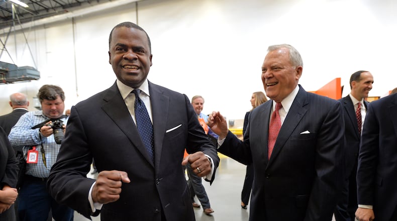 Atlanta Mayor Kasim Reed and Gov. Nathan Deal. HYOSUB SHIN / HSHIN@AJC.COM Atlanta Mayor Kasim Reed (left) with Gov. Nathan Deal at a 2014 event in Savannah. AJC file/Hyosub Shin, hshin@ajc.com