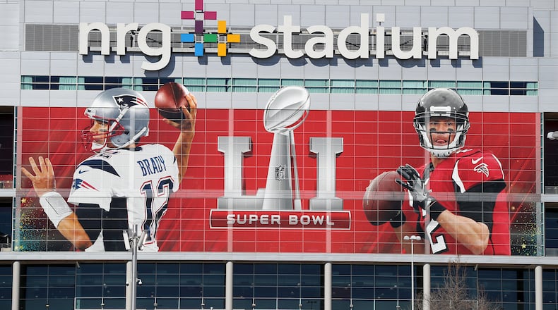 The Falcons and Patriots will play for the Super Bowl tropy in Houston on Sunday. We’ve already been keeping score on Twitter. Photo by Curtis Compton/ccompton@ajc.com