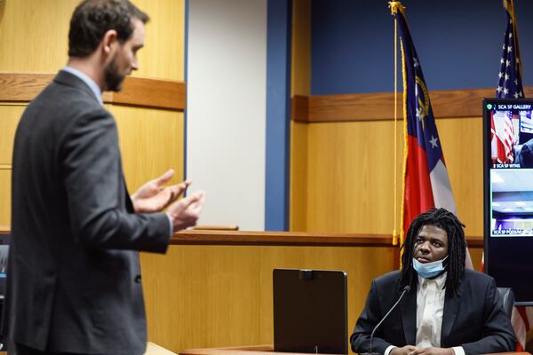 Prosecutor Chris Sperry cross examines Jayden Myrick during his murder trial Wednesday in Fulton County. (Natrice Miller/natrice.miller@ajc.com)  
