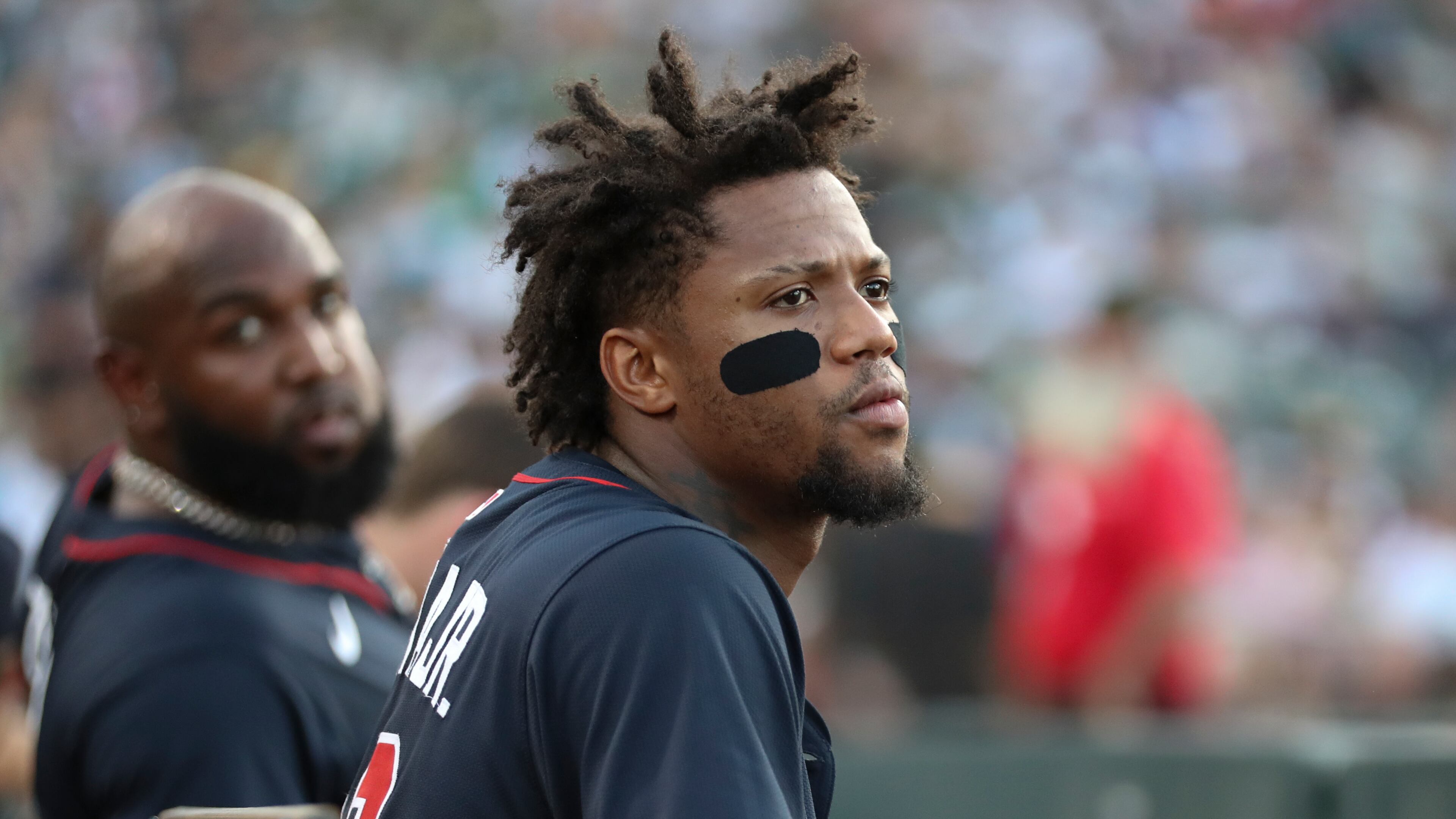 Atlanta Braves' Ronald Acuña Jr. looks on from the dugout during the seventh inning of a baseball game against the Athletics, Thursday, July 10, 2025, in West Sacramento, Calif. (Scott Marshall/AP)