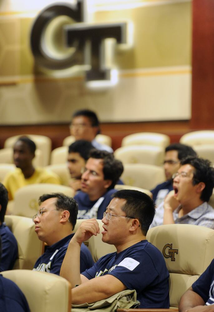 More than 100 international students attended the basic football class.