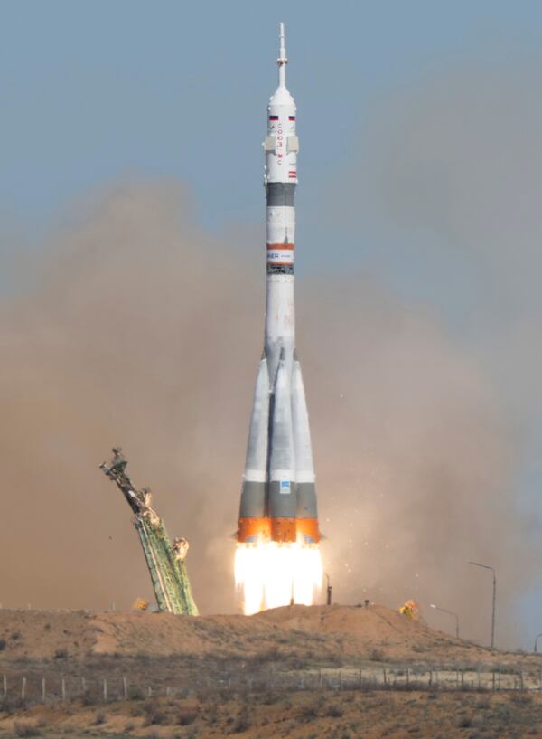 A Russian Soyuz rocket carrying a Soyuz MS-27 spacecraft with NASA astronaut Jonny Kim and Roscosmos cosmonauts Sergey Ryzhikov and Alexey Zubritsky, lifts off for the International Space Station from the Russian leased Baikonur cosmodrome, Kazakhstan, Tuesday, April 8, 2025. (Joel Kowsky/NASA via AP)