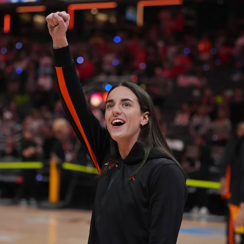 FILE - Indiana Fever's Caitlin Clark reacts to fans before the WNBA All-Star basketball game, Saturday, July 19, 2025, in Indianapolis. (AP Photo/Michael Conroy, file)