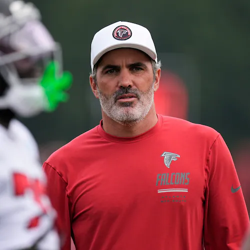 Atlanta Falcons head coach Kevin Stefanski watches the team work out during an NFL training camp, Friday, Aug. 7, 2026, in Flowery Branch, Ga. (AP Photo/Mike Stewart)