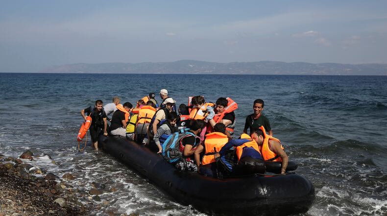 Syrian and Iraqi refugees arrive in Greece. ICYMI this humanitarian crisis has been going on for years now. (AP Photo / Petros Giannakouris)