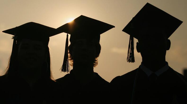 Atlanta Public Schools has once again delayed in-person graduation ceremonies because of the coronavirus. AJC FILE