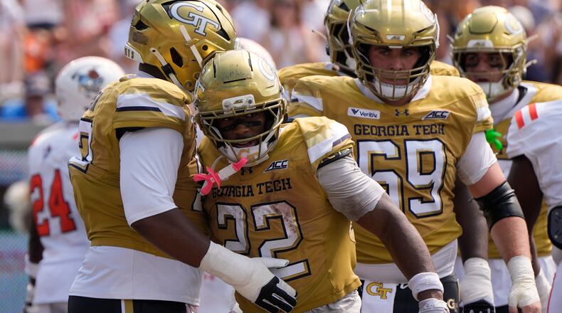 Georgia Tech running back Justice Haynes (22) celebrates his touchdown against Mercer in the first half of an NCAA college football game, Saturday, Sept. 19, 2026, in Atlanta. (AP Photo/Mike Stewart)