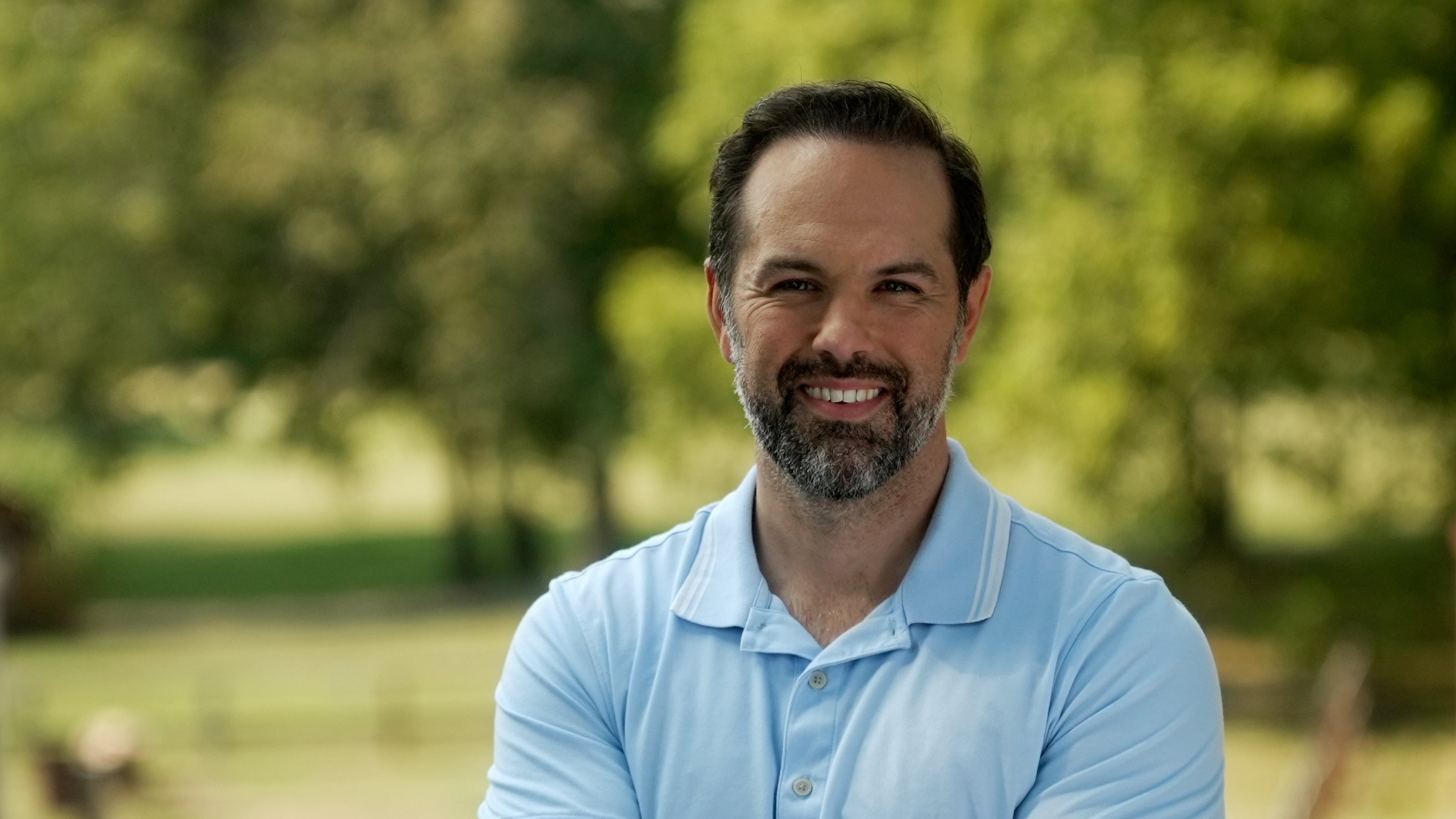 In this photo released by Joel Willett, U.S. Senate candidate Joel Willett poses for a photo on Sept. 11, 2025, in Valley Station, a suburb of Louisville, Ky. (Joe Willett via AP)