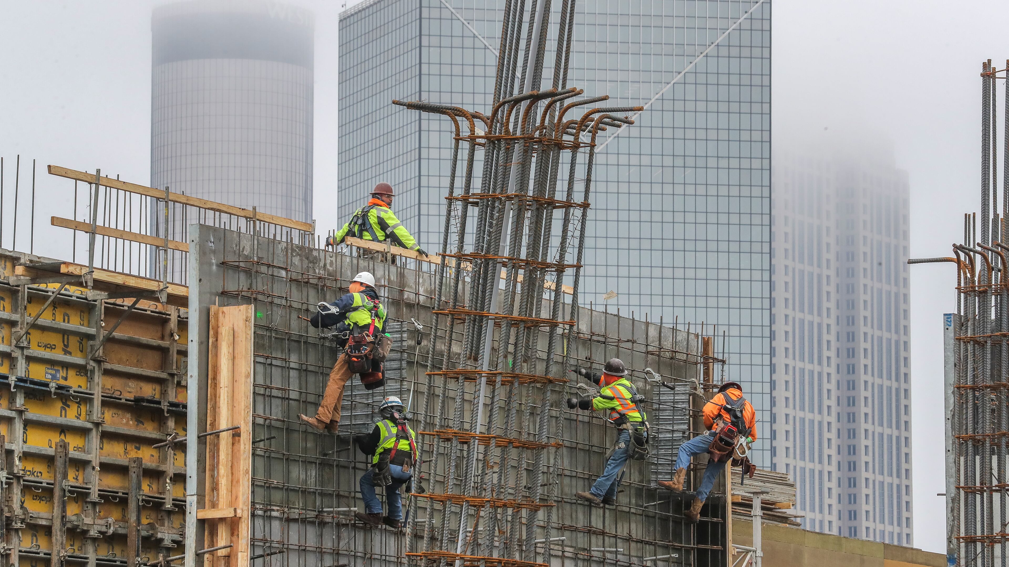 Overall, metro Atlanta added 72,000 jobs last year. The construction sector, which has about 146,000 workers, grew by 4,700. Here, workers are on an 18-story, 304-unit apartment tower being built across from Mercedes-Benz Stadium near downtown. (John Spink / John.Spink@ajc.com)