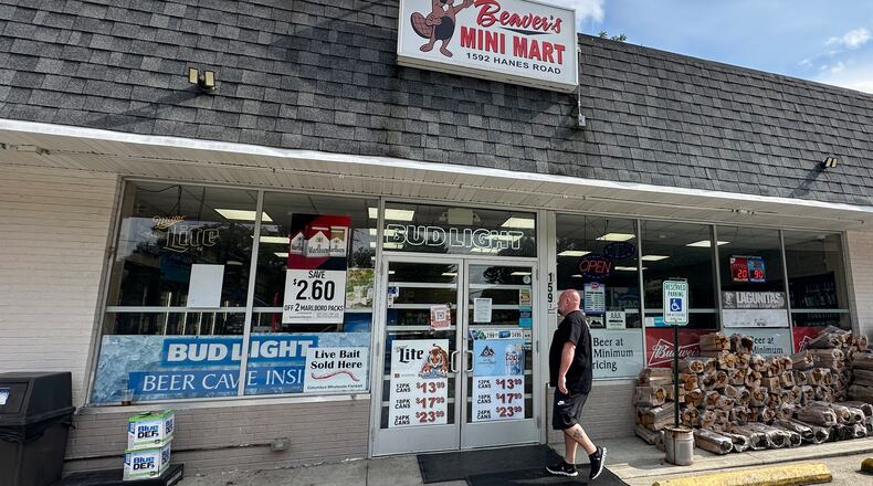 A customer walks into Beaver's Mini Mart in Beavercreek, Ohio, Friday, Aug. 14, 2026. (AP Photo/Julie Carr Smyth)