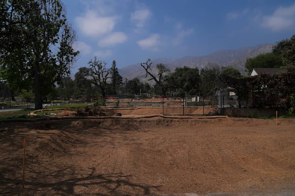 Lots sit empty after the Eaton Fire in January swept through Altadena, Calif., Wednesday, June 4, 2025. (AP Photo/Jae C. Hong)