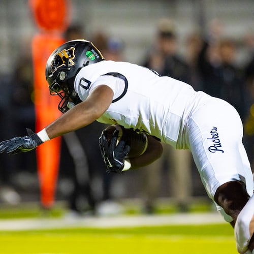 Colquitt tight end Alexis Barge Jr. (0) makes a catch during the first half against Mill Creek at Mill Creek Community Stadium in Hoschton on Nov. 14th, 2025. (Oscar Guevara Saenz for the AJC)