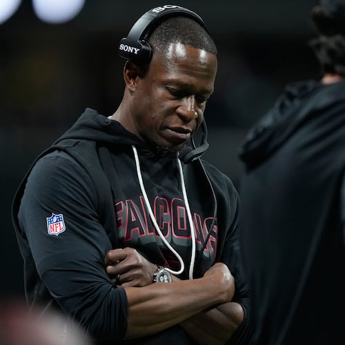 Atlanta Falcons head coach Raheem Morris looks down on the sideline as his team trails against the Seattle Seahawks during the second half of an NFL football game, Sunday, Dec. 7, 2025, in Atlanta. (AP Photo/Brynn Anderson)