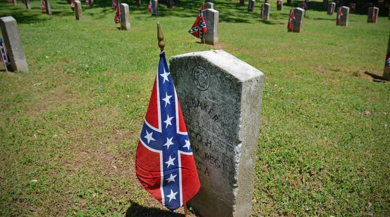 The last Monday in April is designated Confederate Memorial Day in Georgia, which is an official state holiday and state offices are closed for the day.  In this photo, hundreds of Confederate flags adorn graves of soldiers buried in the Confederate section of Oakland Cemetery during Confederate Memorial Day Observance at the Historic Oakland Cemetary in Atlanta on April 26, 2014.