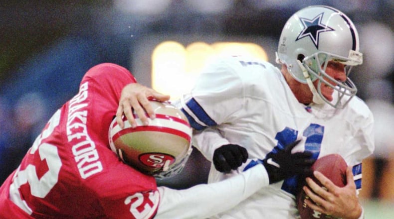 Wade Wilson (11) played for five NFL teams, including the Falcons in 1992. (AP Photo/Eric Gay)