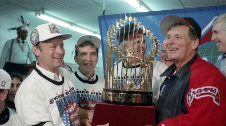 On Oct. 28, 1995, left to right, Braves president Stan Kasten, general manager John Schuerholz, owner Ted Turner and manager Bobby Cox celebrate the World Series championship.