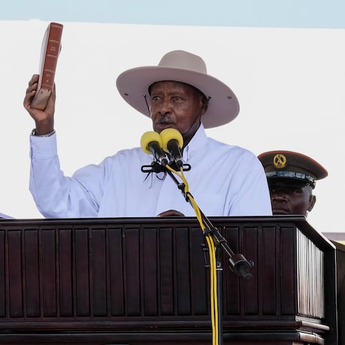 Uganda's long-time president Yoweri Museveni, 81, takes an oath of office during the inauguration ceremony for a seventh consecutive five-year term, in Kampala, Uganda, Tuesday, May 12, 2026. (AP Photo/Hajarah Nalwadda )