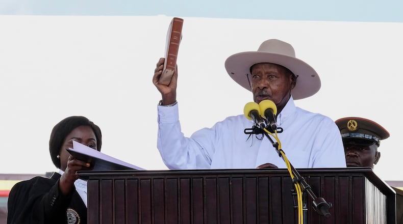 Uganda's long-time president Yoweri Museveni, 81, takes an oath of office during the inauguration ceremony for a seventh consecutive five-year term, in Kampala, Uganda, Tuesday, May 12, 2026. (AP Photo/Hajarah Nalwadda )
