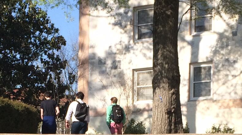 A serial chalker in support of Donald Trump has alarmed some Emory University students. A Trump opponent apparently added "STOP" in front of "TRUMP 2016." And yes, the first word in the chalk message is misspelled. Photo by Bill Torpy